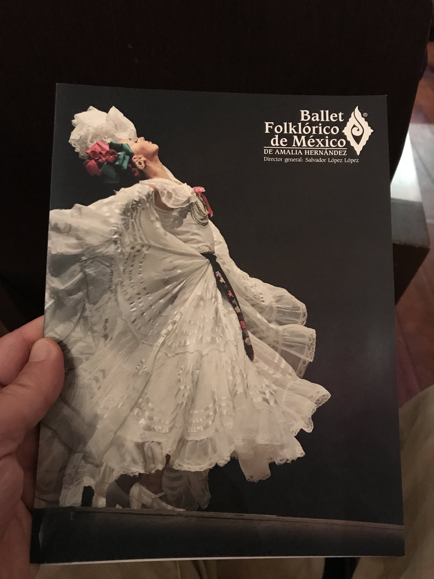 The Ballet Folklórico de México program, a dancer in a flowing white skirt on the cover