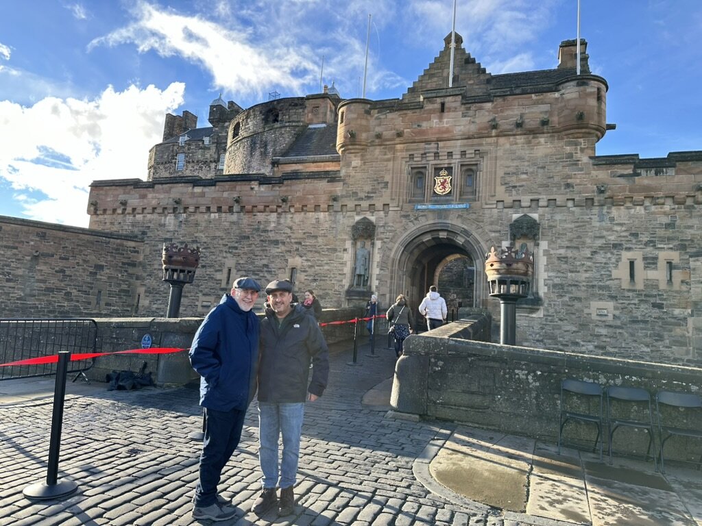Dad and He-Stache in front of Edinburgh Castle's gatehouse