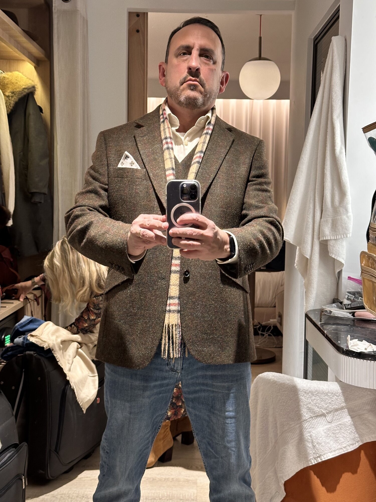 He-Stache's mirror selfie in his new tweed blazer and tartan scarf from Victoria Street