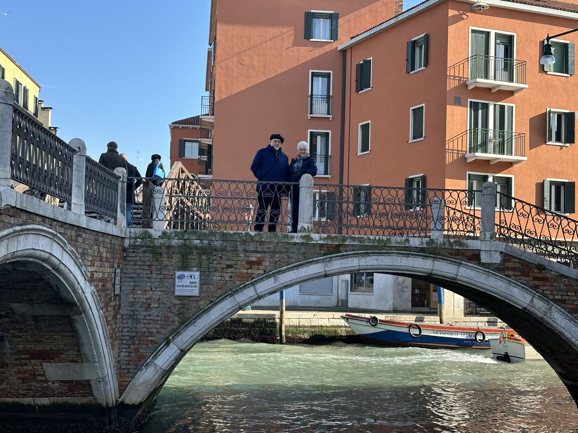 Mom and Dad pausing on one of Venice's hundreds of bridges