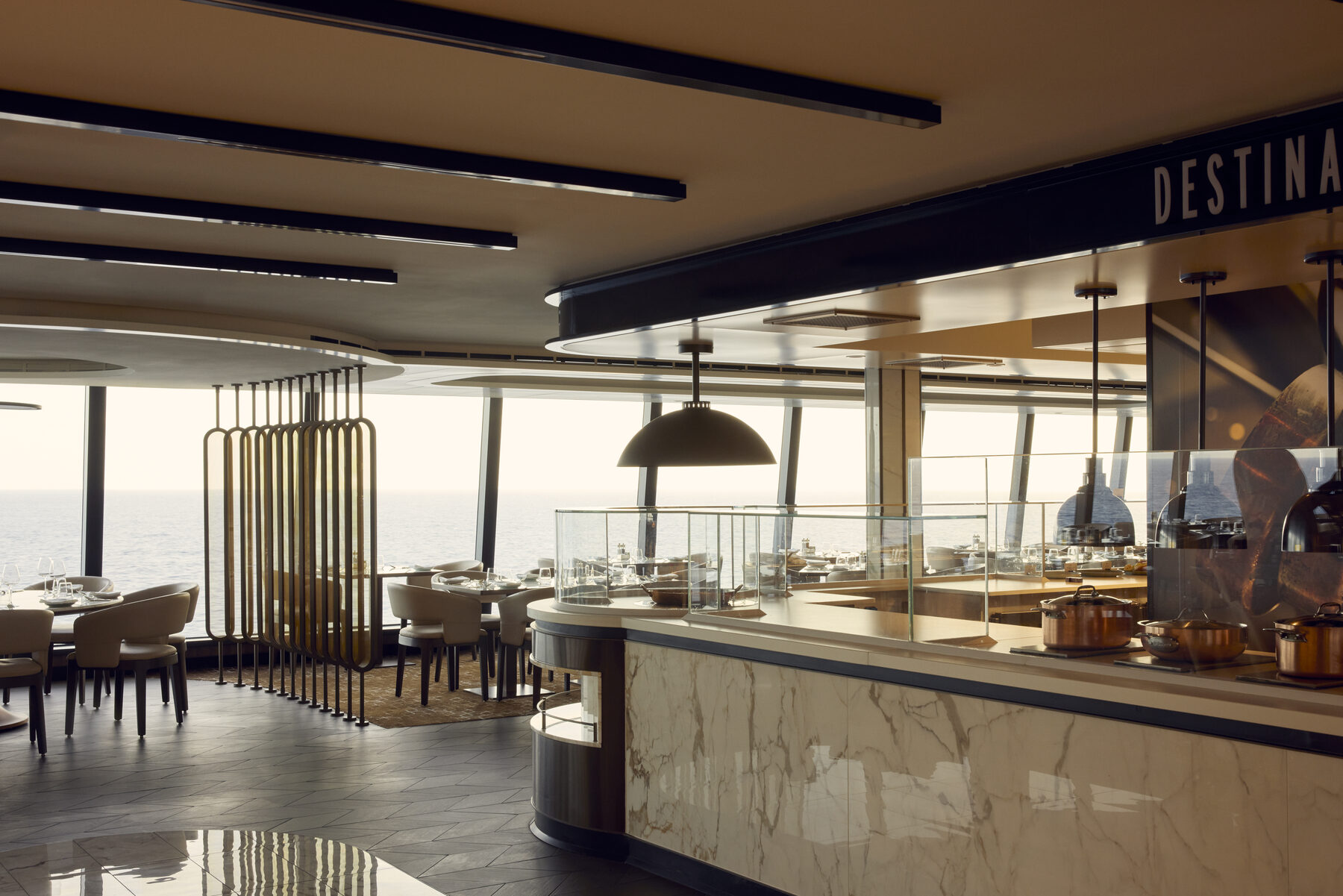 Explora media kit photo of the Emporium Marketplace counter with ocean views behind it