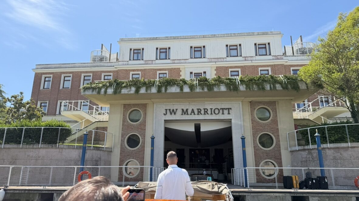 The JW Marriott Venice building seen from the water taxi as it pulls up to the hotel dock